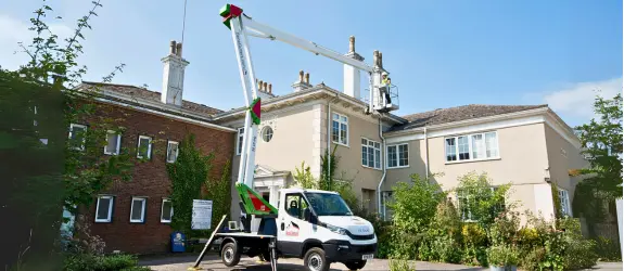 using our cherry picker on a commercial gutter cleaning job in Filwood, Northern Ireland