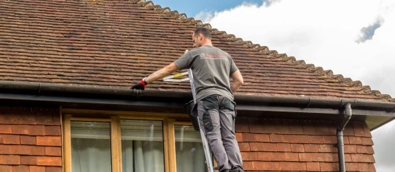 our team cleaning the gutters on a house in Stoke Bishop, Northern Ireland